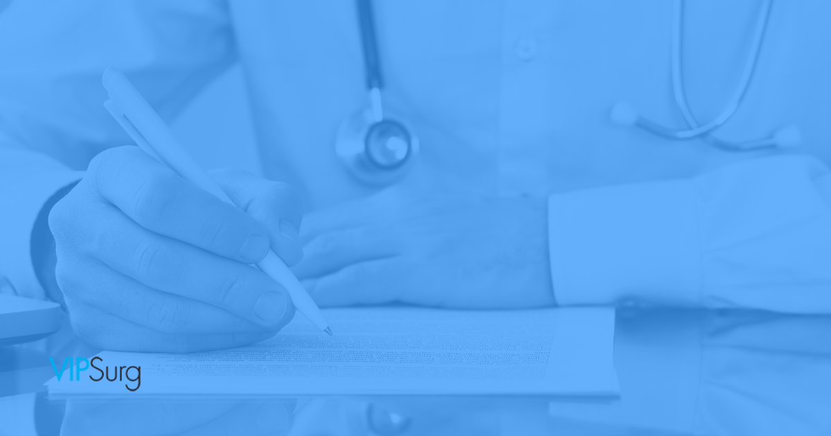 Doctor with a stethoscope writing something on a piece of paper